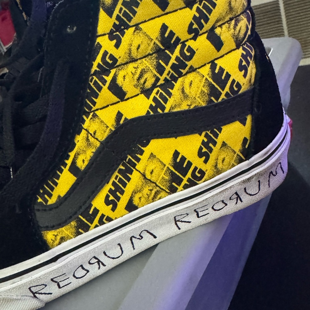 Vans Black and Yellow High-Tops with Graphic Design